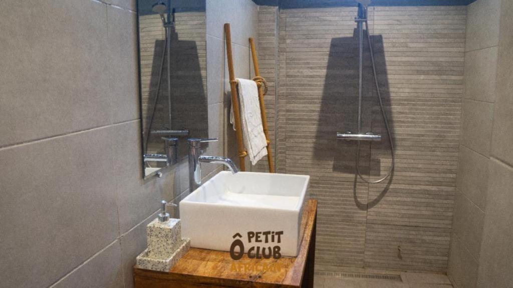 O Petit Club Africain Couette-café Dakar